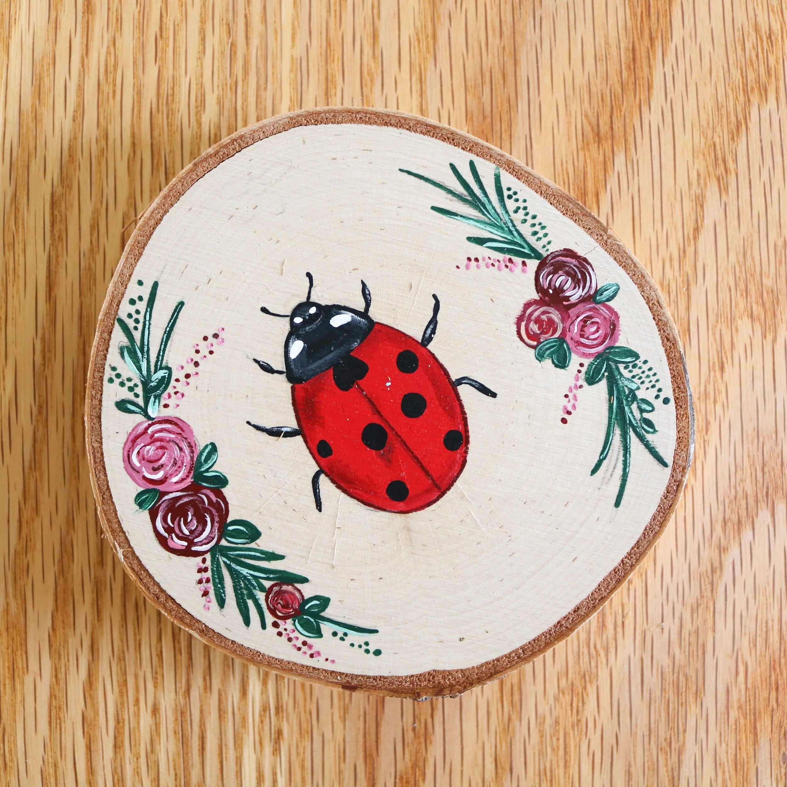 Tranche d'arbre coccinelle