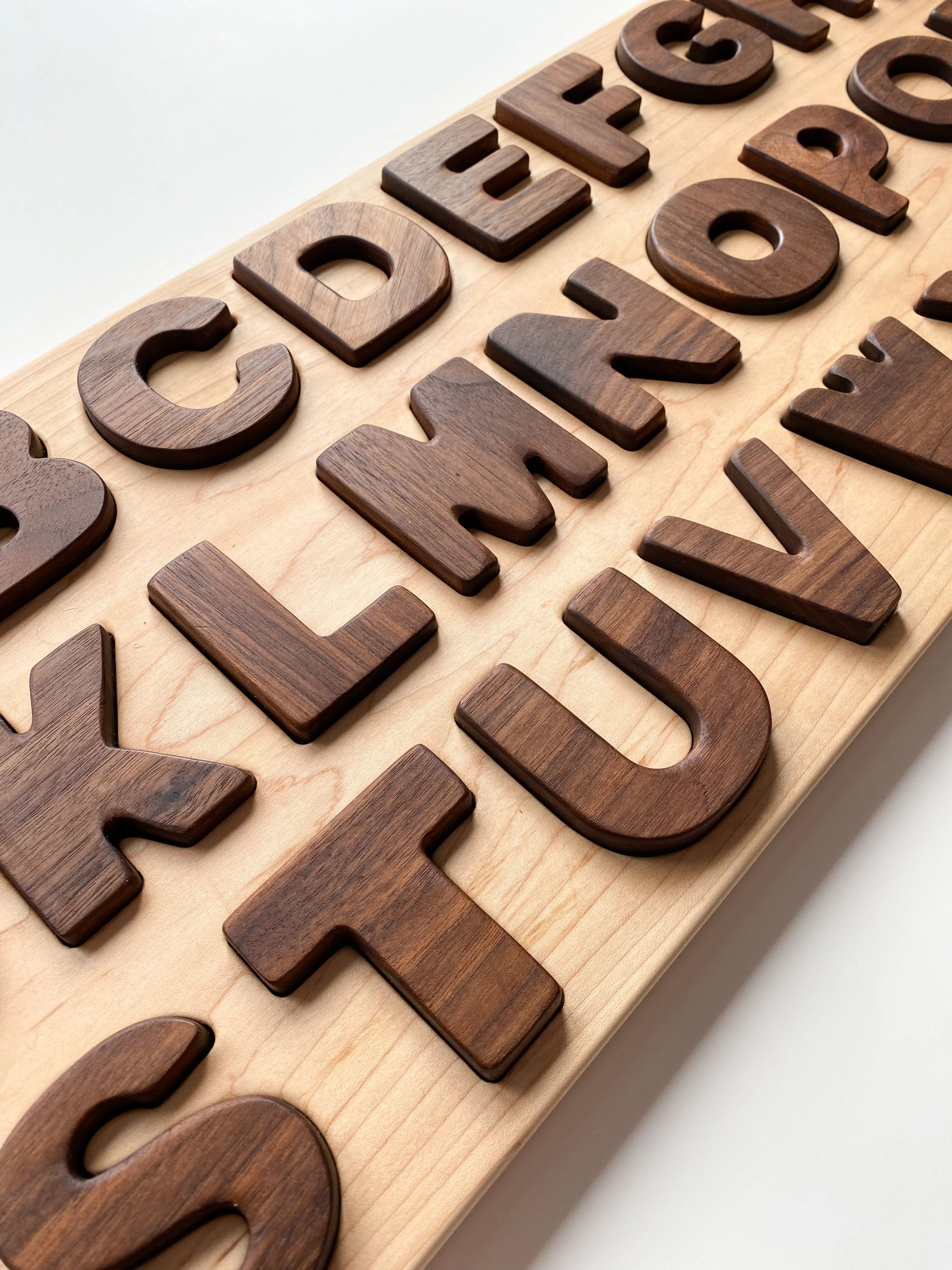 Puzzle XL en majuscules de l'alphabet