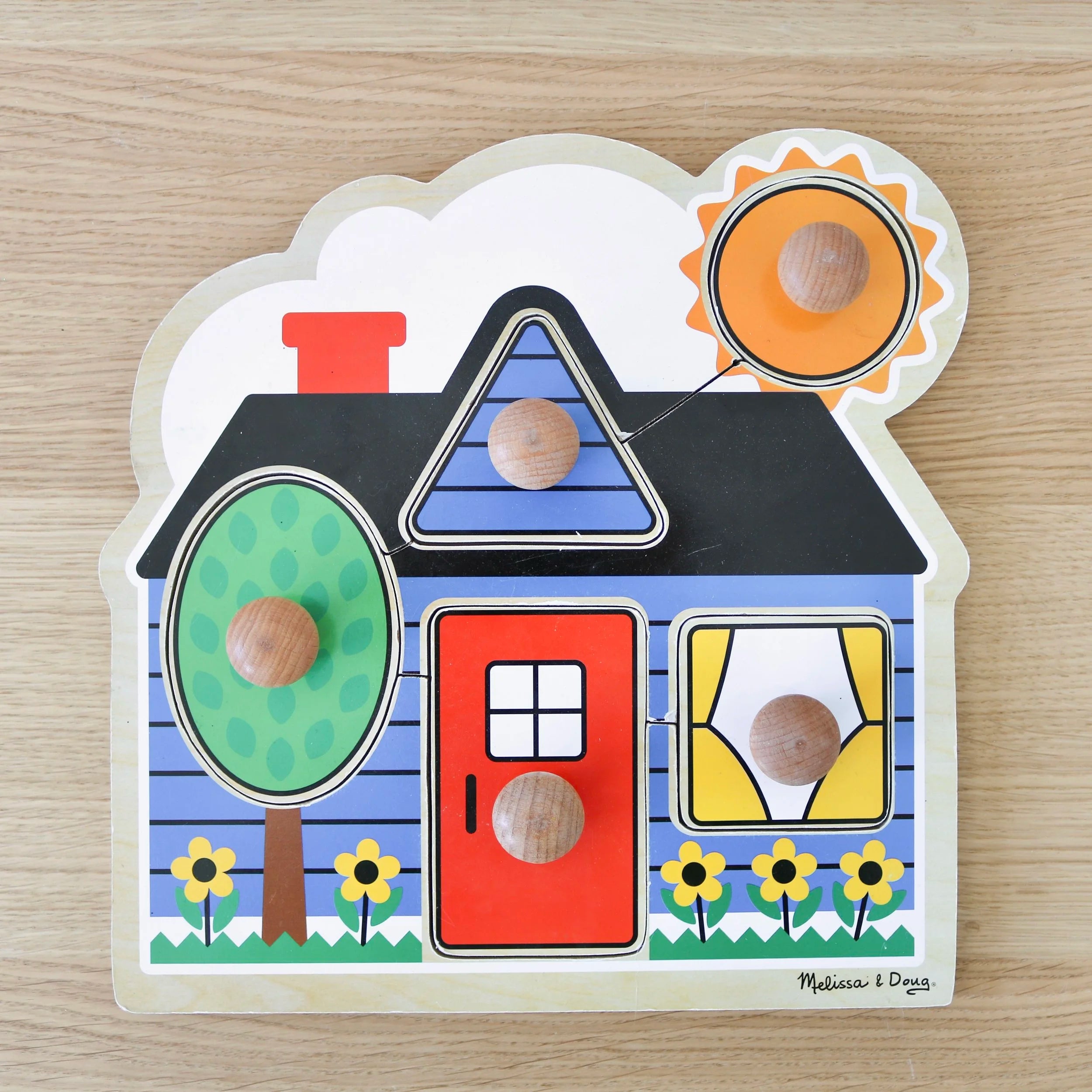 Puzzle de la maison à gros boutons 