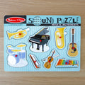 Puzzle sonore en bois d'instruments de musique 