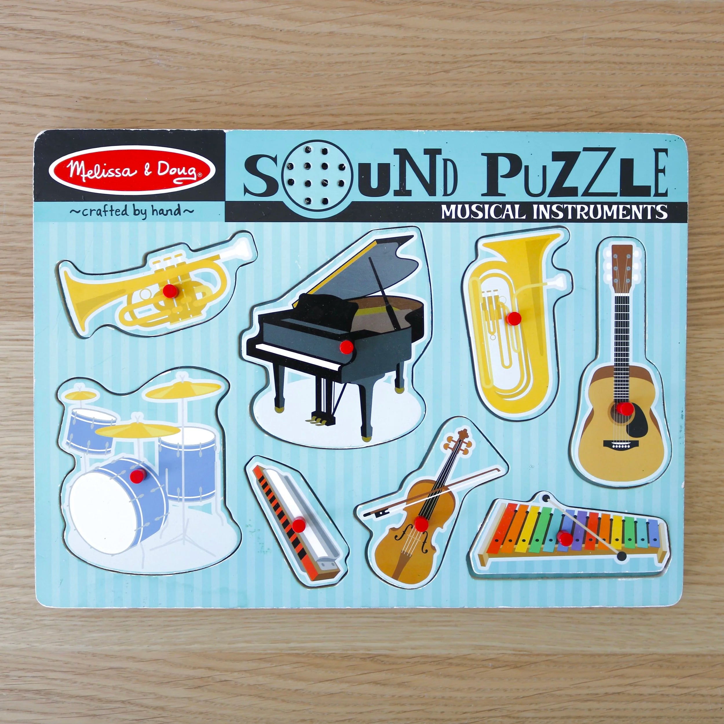 Puzzle sonore en bois d'instruments de musique 